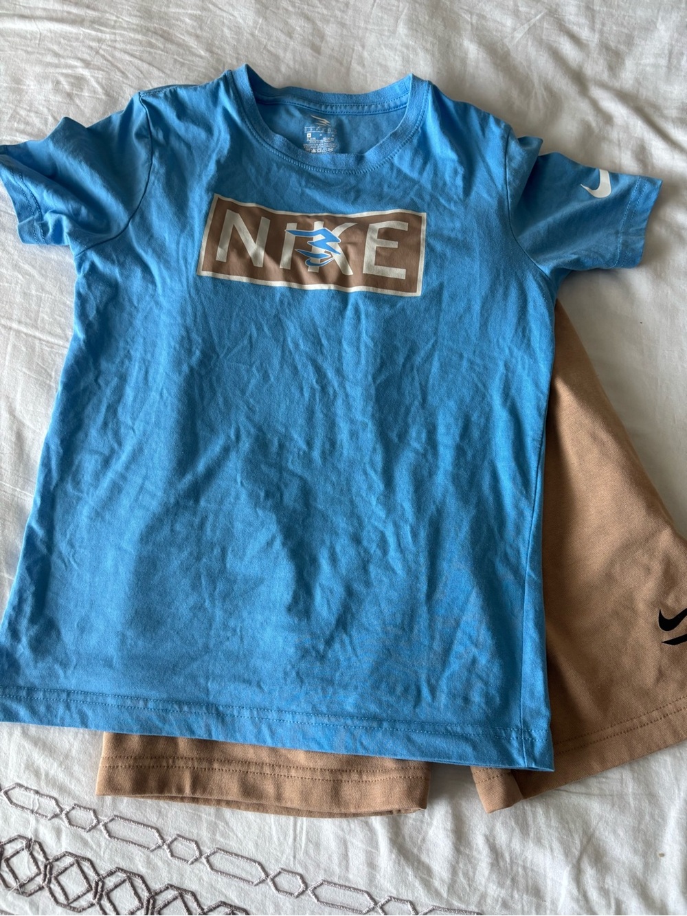 Nike Blue Tee with Brown Logo Patch
